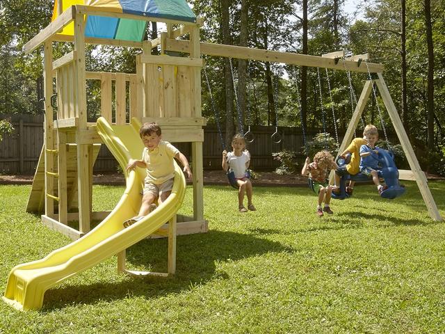 A do-it-yourself wooden play set built from a hardware kit